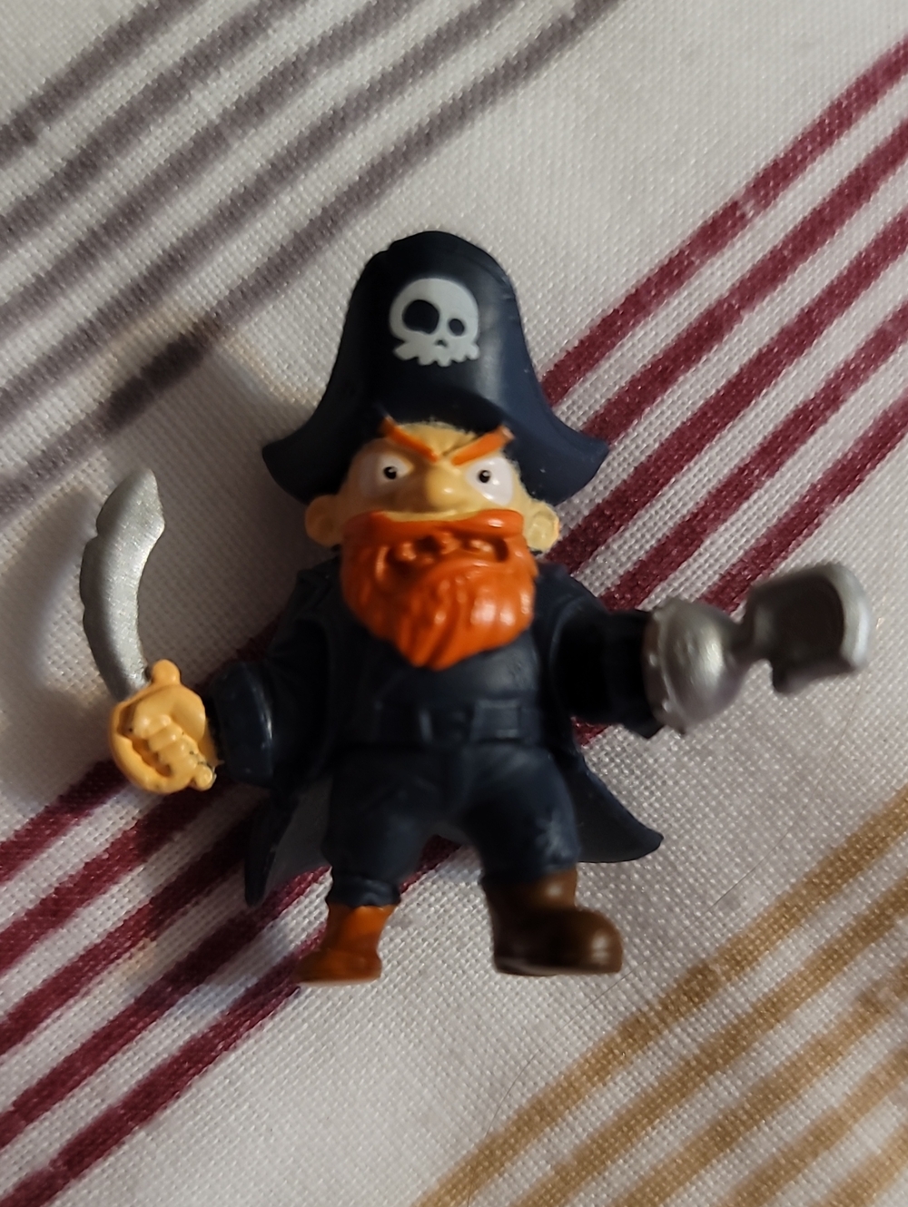 Zuru Smashers Dino Island "Red Beard Pirate" Micromini figure.
